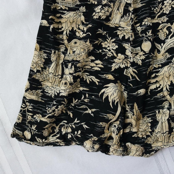 Oriental patterned black and tan colored long skirt - Picture 2 of 8